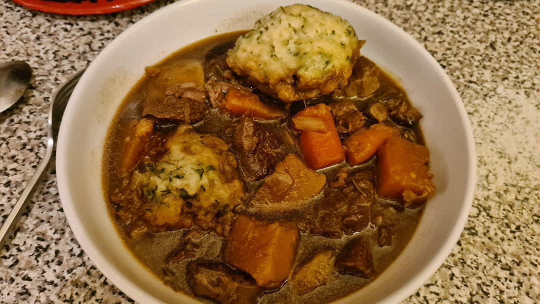 Beef and ale stew and herby dumplings. Dining and Cooking