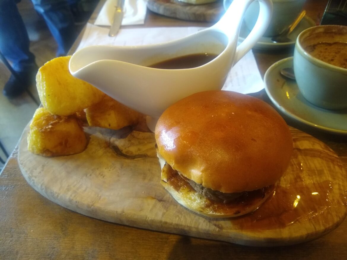 Half a pint of gravy spilled on the table