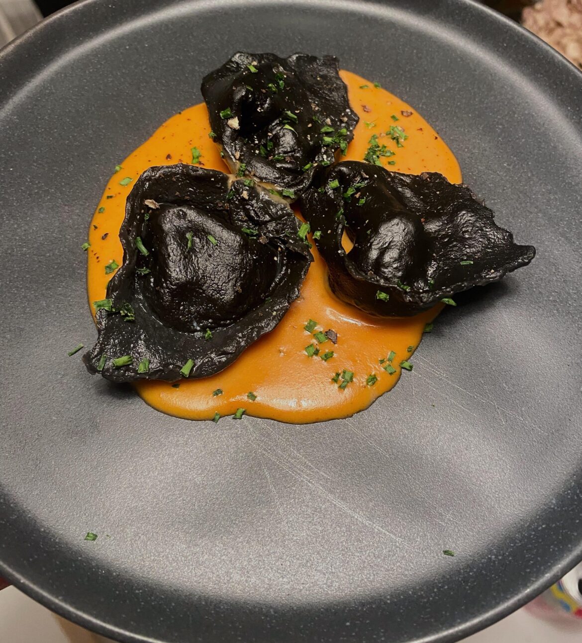 Squid ink lobster ravioli w lobster bisque sauce