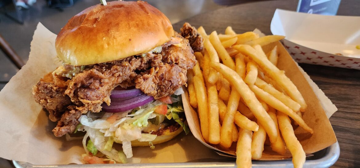 Massive messy fried chicken I got but worth it! Pints and paddles minnesota.