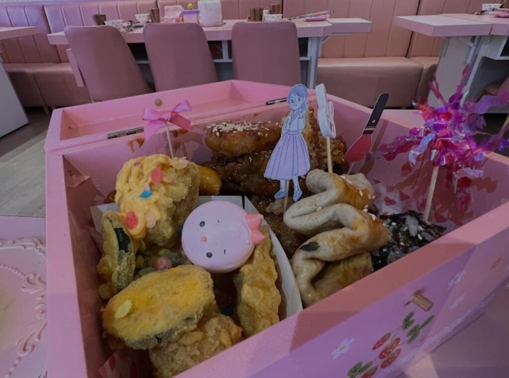 Tempura and I believe fishcakes served in a jewelery box in Taiwan