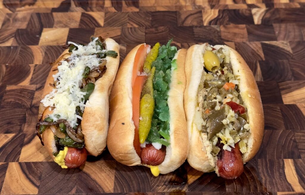 beef dogs 3 ways: onion, jalapeño, cheddar, jalapeño mustard. onion, relish, tomato, sport pepper, celery salt, yellow mustard. giardiniera and dijon.