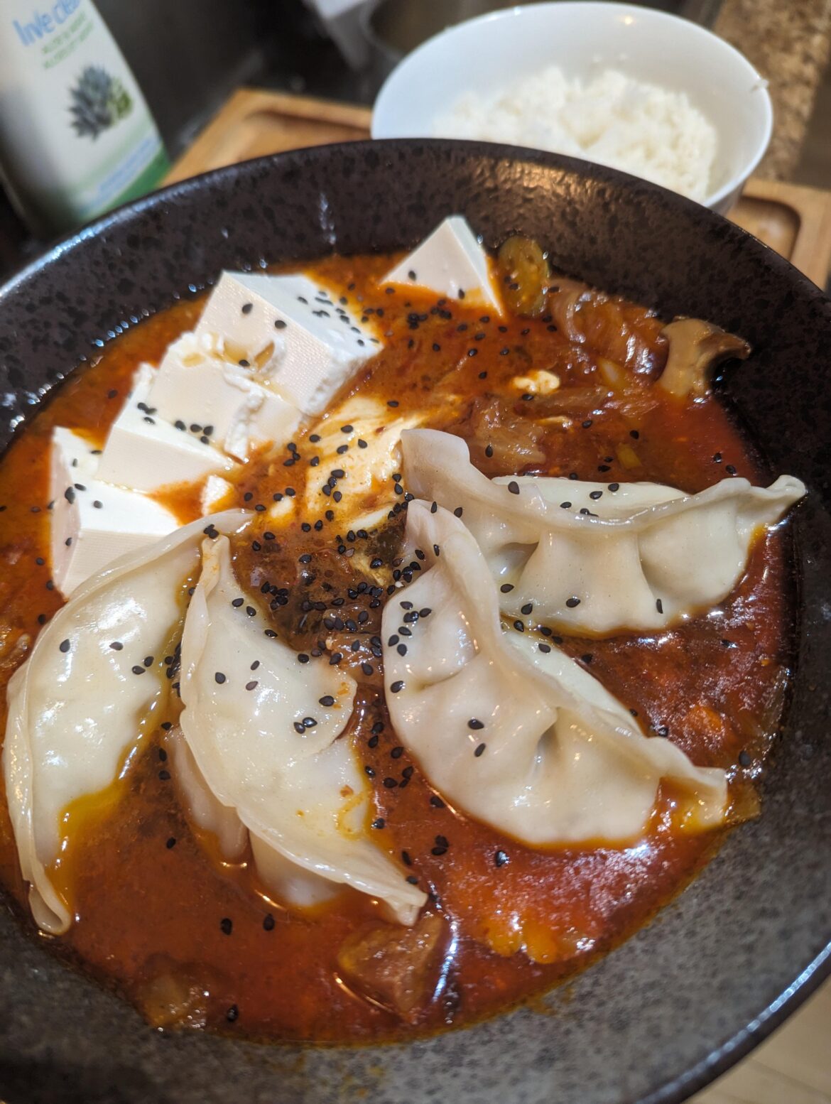 Made Aaron and Claire's sundubu kimchi jjigae. Added old bay, Kombi, CORN. Pork Mandu.