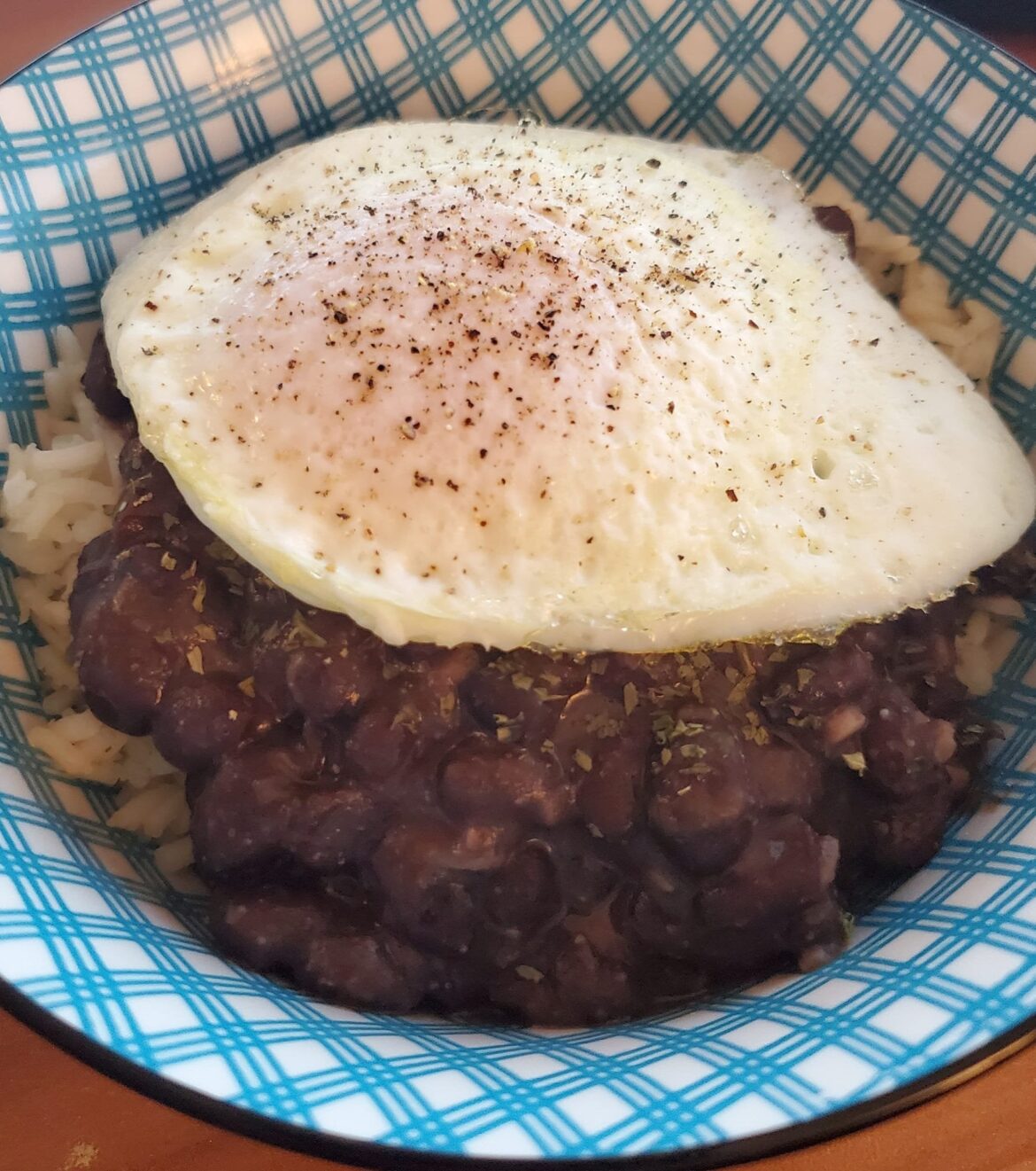 Black beans and rice with a delicious topper.