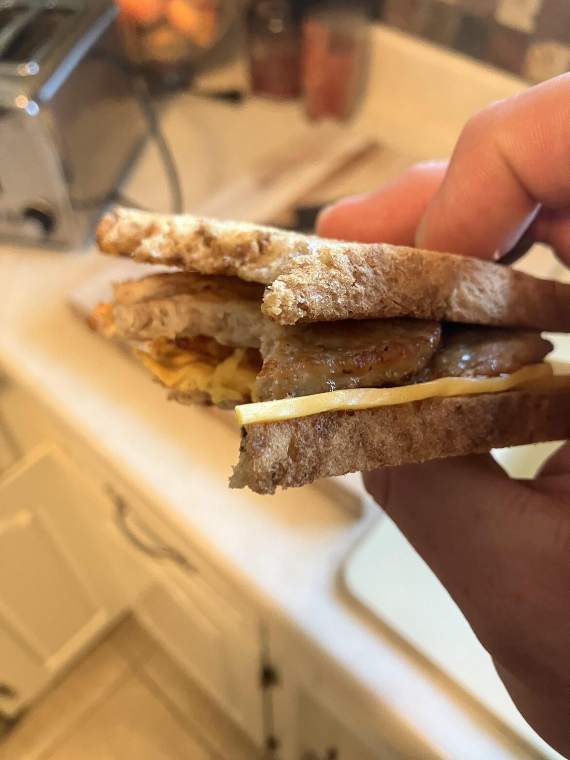 Made pancakes and sausage patties for the kids. I'm not much of a pancake guy so I went to make myself a breakfast sandwich. Turns out we need eggs and English muffins, so sausage on rye toast with American it is. And hot sauce.
