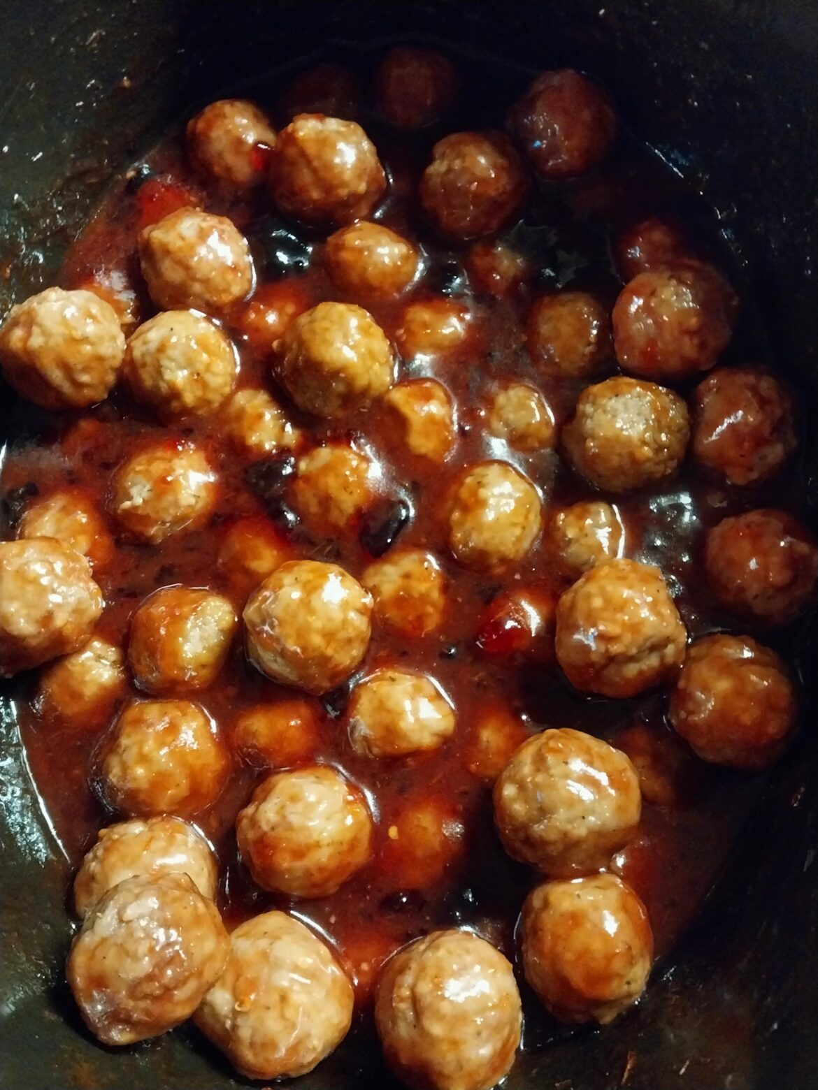 My coworkers are gonna get blessed with some tasty meatballs at our holiday party this afternoon. Just a bag of meatballs, a jar of grape jelly and a bottle of chili sauce. Pure Americana.