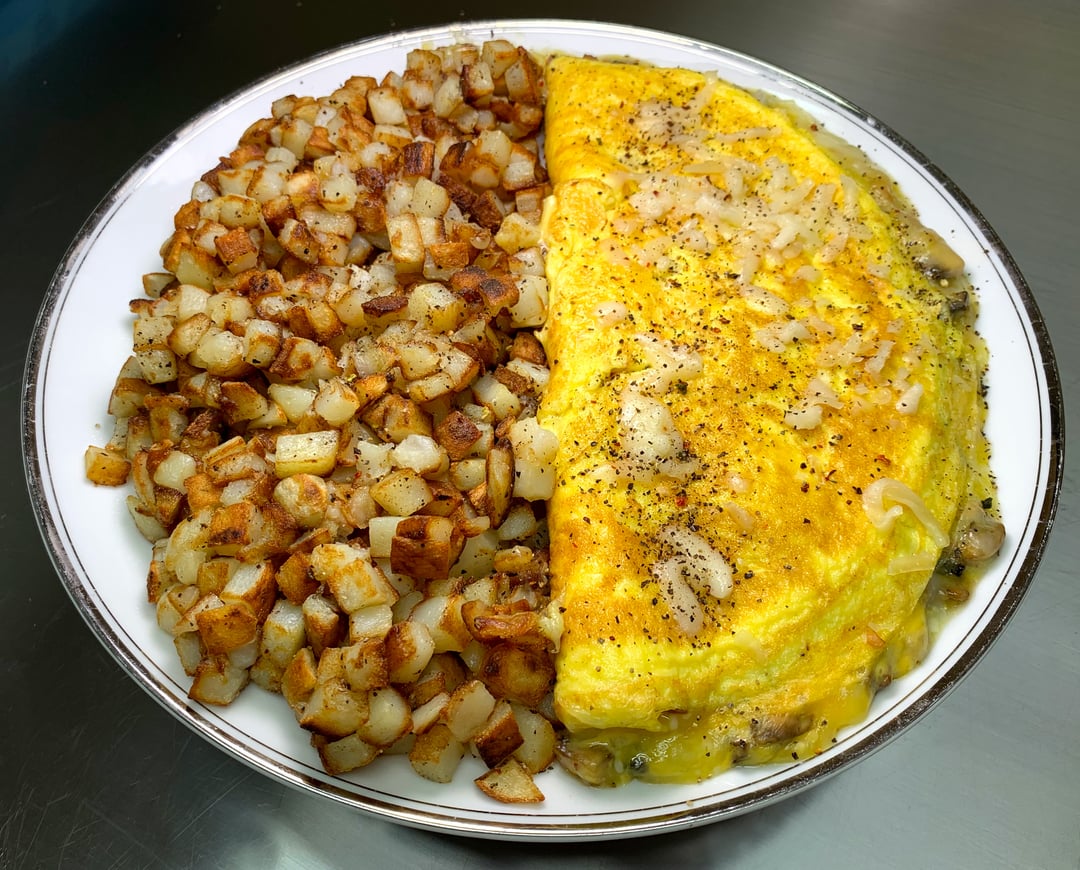 [Homemade] Mushroom Ham and Cheese Omelette and Home Fries Dining and