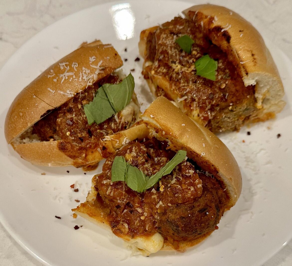 Meatballs/Hot Italian Sausage/Marinara/Mozzarella/Parmigiana/Basil