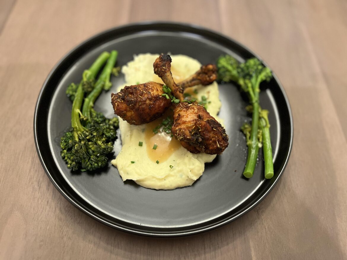 Chicken lollipops over parsnip purée with broccolini