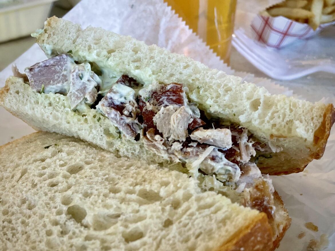 Mixed smoked fish sandwich on sourdough with house made tartar from Point Loma Seafoods, San Diego, CA