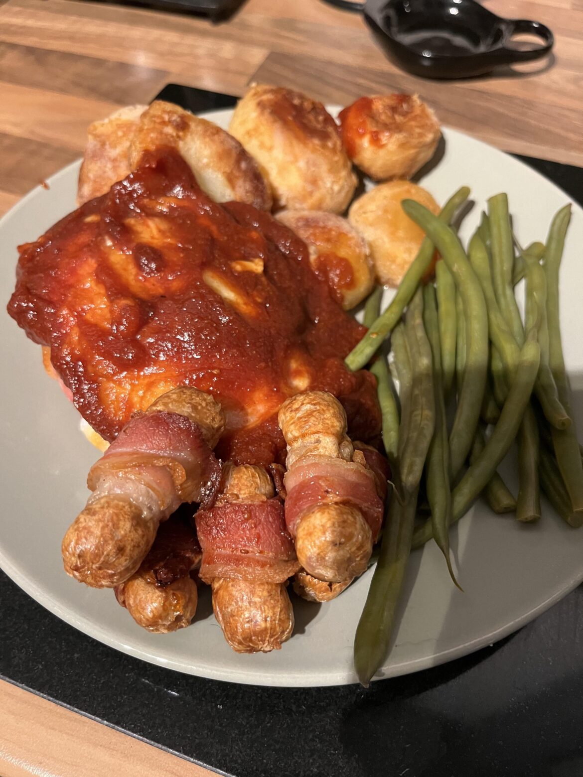 Homemade Hunters Chicken with roast potatoes and pigs in blankets
