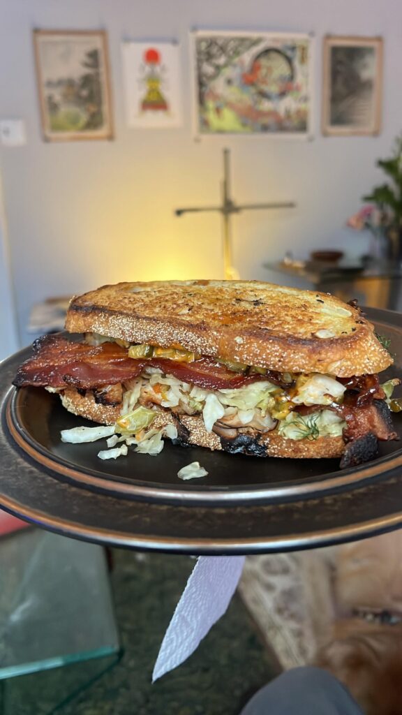 Sautéed turkey with pepper, isigny butter, and maple syrup baked sandwich with maple bourbon peppered bacon, pleasant ridge reserve, dill, cle kraut whiskey dill, giardiniera, and a sauce made out of bubbies spicy pickle,honeycup honey mustard, hellmans mayo, pepper, and Lao Gan Ma Spicy Chili Crisp Sautéed turkey with pepper, isigny butter, and maple syrup baked sandwich with maple bourbon peppered bacon, pleasant ridge reserve, dill, cle kraut whiskey dill, giardiniera, and a sauce made out of bubbies spicy pickle,honeycup honey mustard, hellmans mayo, pepper, and Lao Gan Ma Spicy Chili Crisp