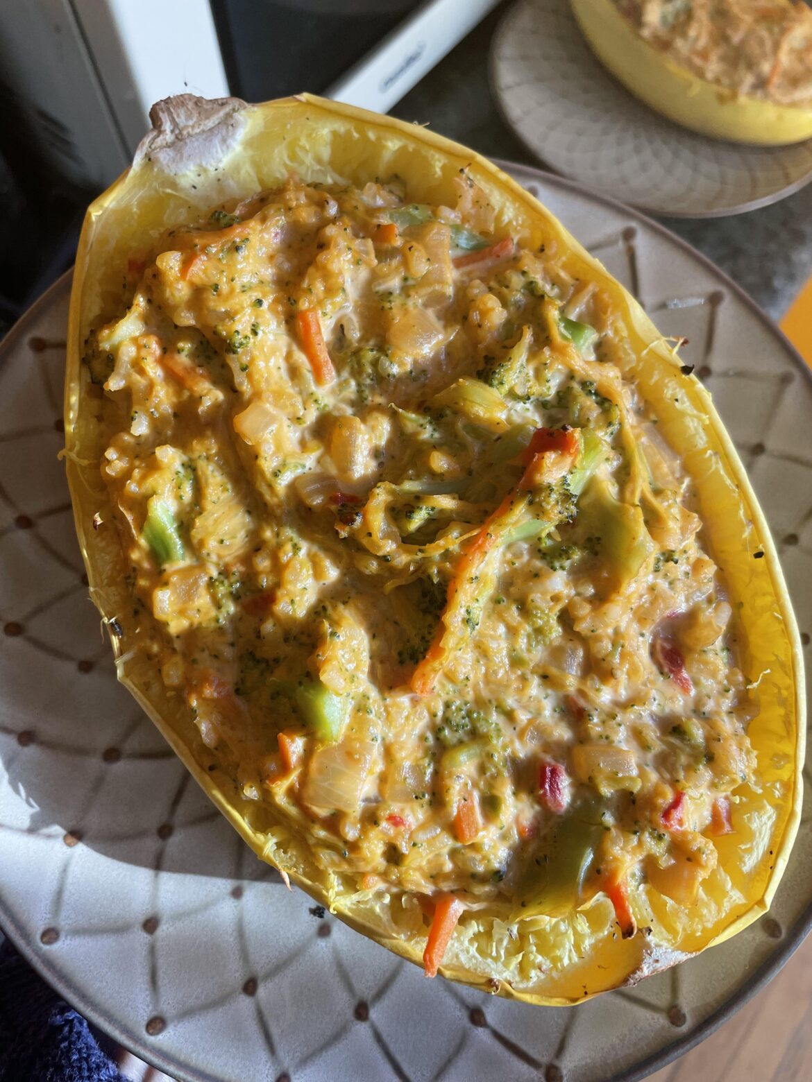 Jazzed up broccoli cheddar stuffed spaghetti squash 😋