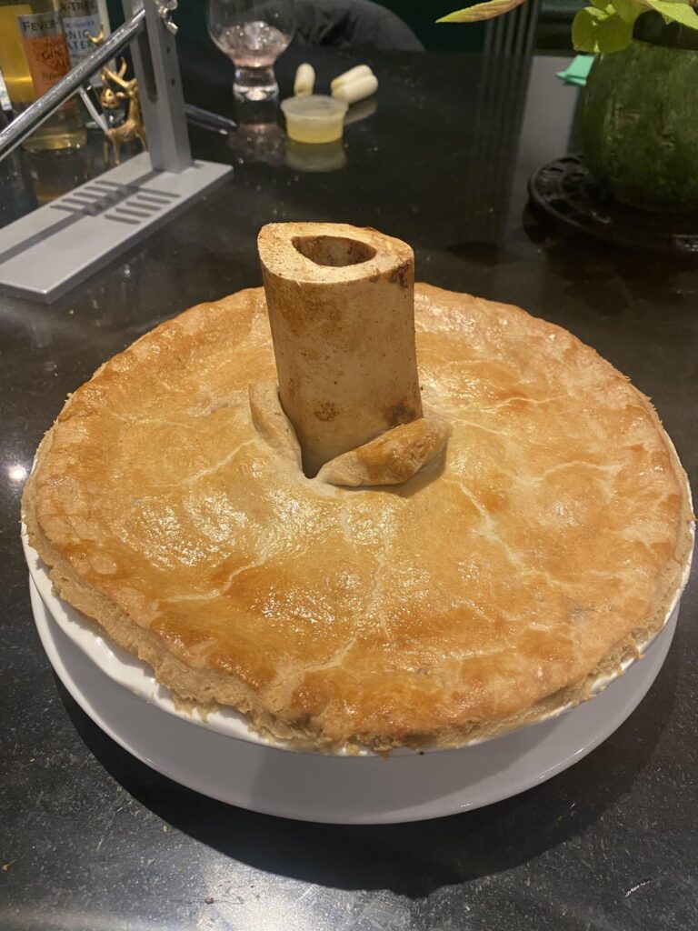 Steak and shallot pie with bone marrow pastry