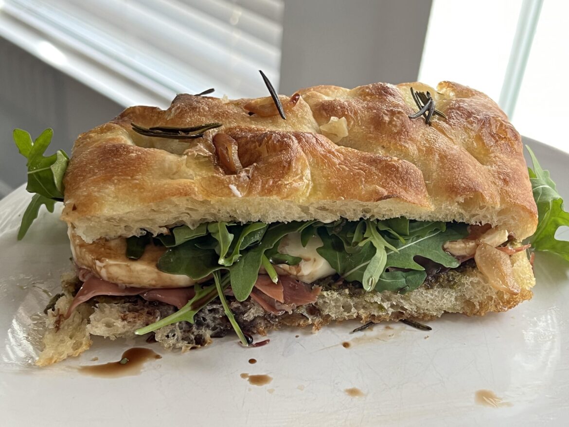 Prosciutto, mozzarella, pesto, arugla & balsamic on homemade focaccia