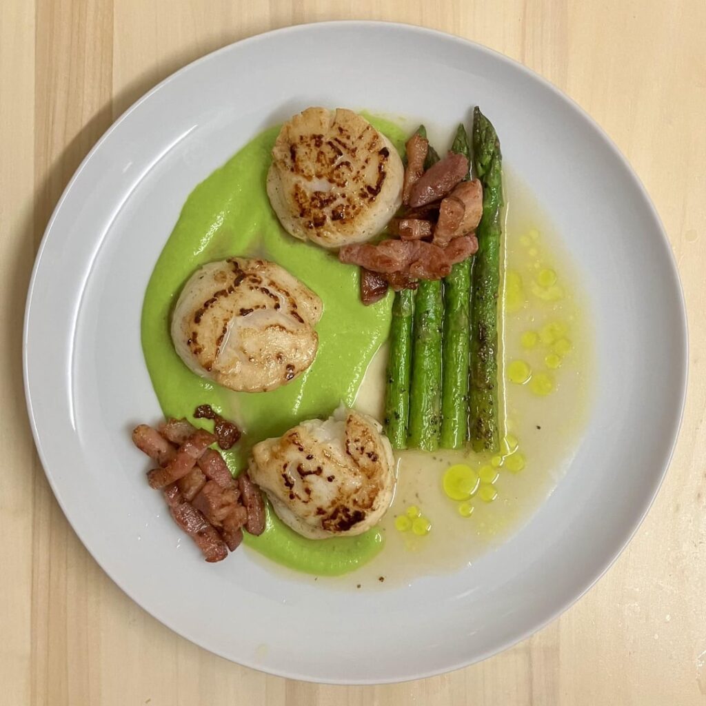 Seared Scallops with Bacon, Pea Purée, Chargrilled Asparagus and an Onion Broth