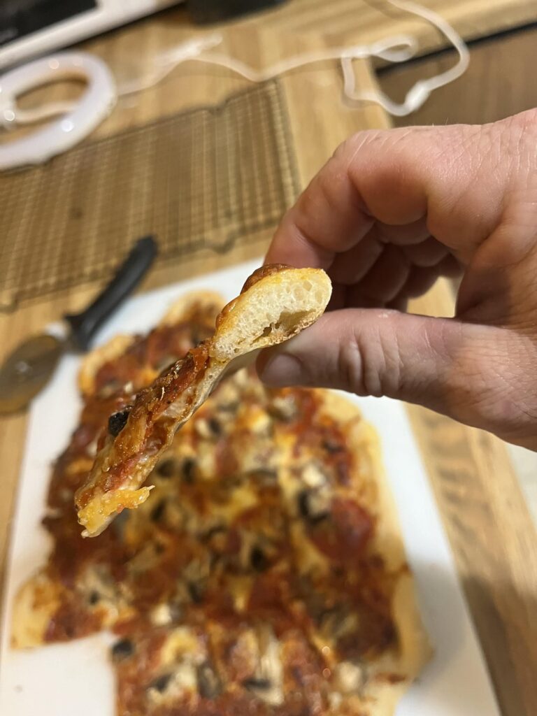 Pepperoni and mushroom pizza. And a bacon cheeseburger calzone that was a pizza until it got dropped