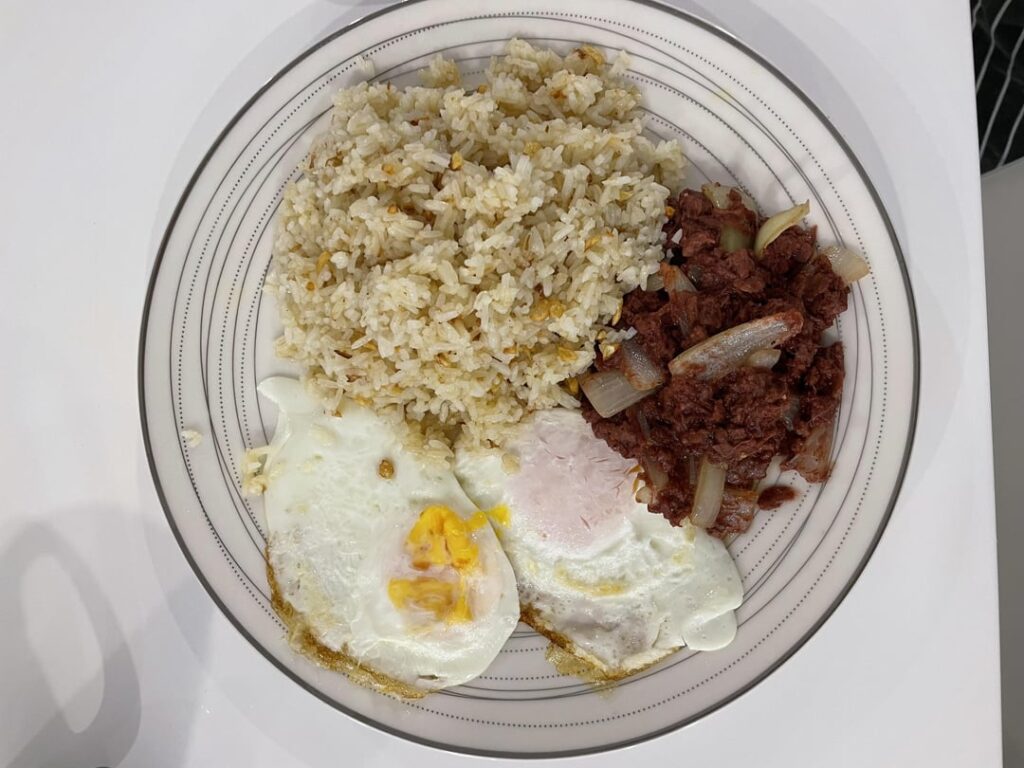 Fried Sunny Side Up Egg W/ CornBeef Hash & Garlic Fried Rice