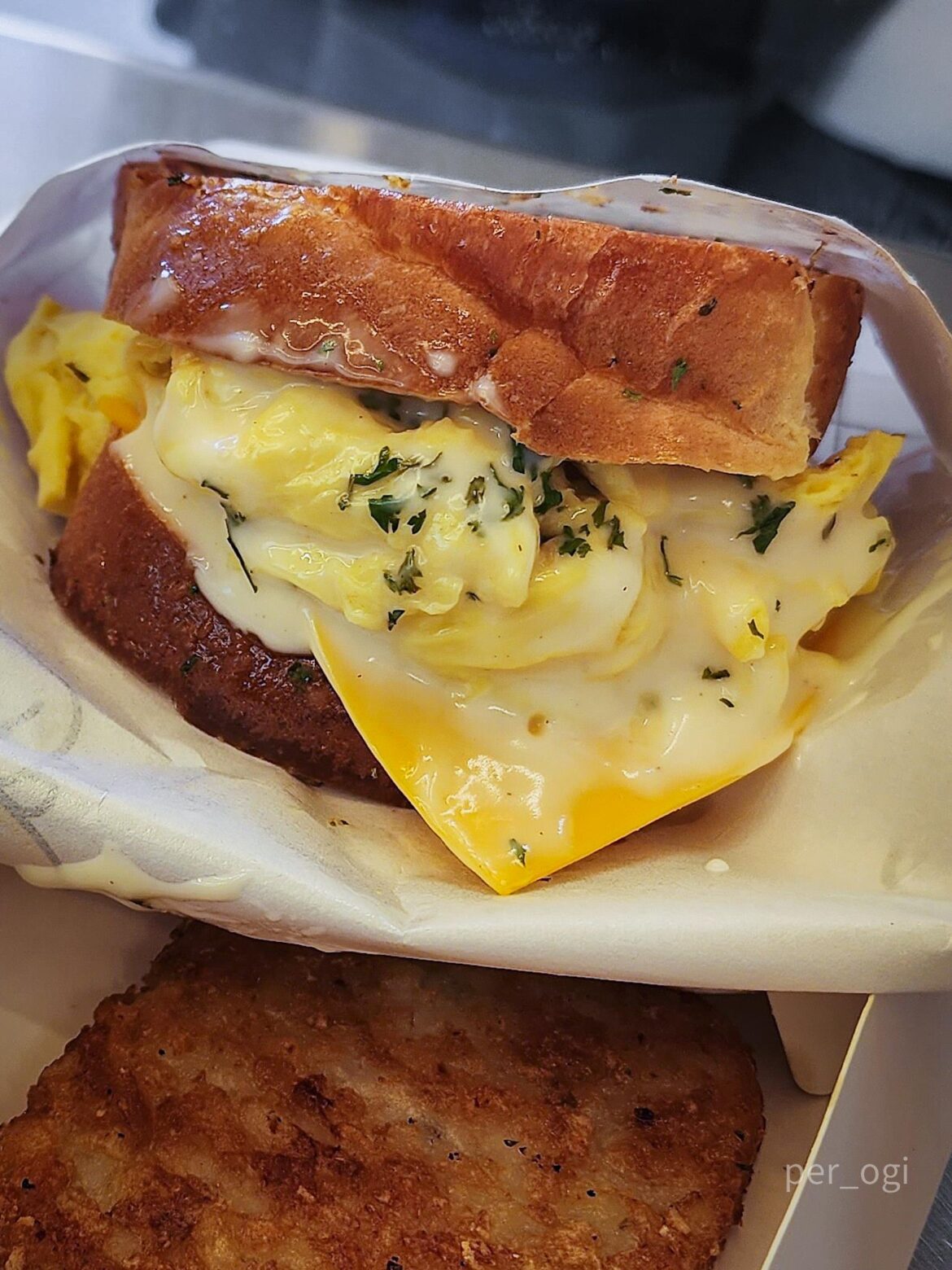 Egg sandwich w/ ham, cheese, sweet sauce, on garlic toast