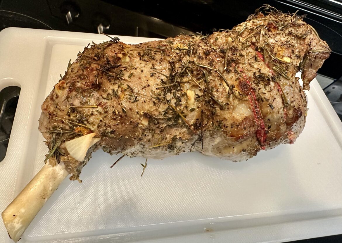 Leg of lamb with salt, pepper, garlic, oregano, thyme, rosemary and lemon juice. Cooked to medium rare and served with a mustard vinaigrette. Delicious.