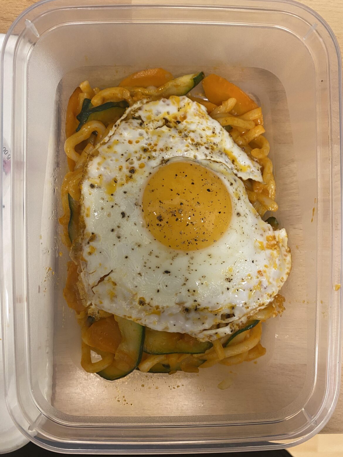 Udon with veggies and gochujang sauce, fried the egg in the same pan as the rest for some extra spice