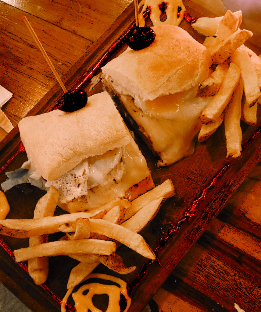 sandwich with goat cheese, fried egg, lettuce tomato and a touch of olive