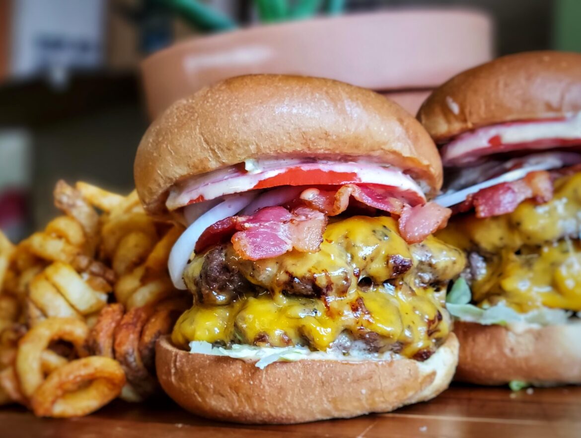 Bacon double cheeseburgers and curly fries.