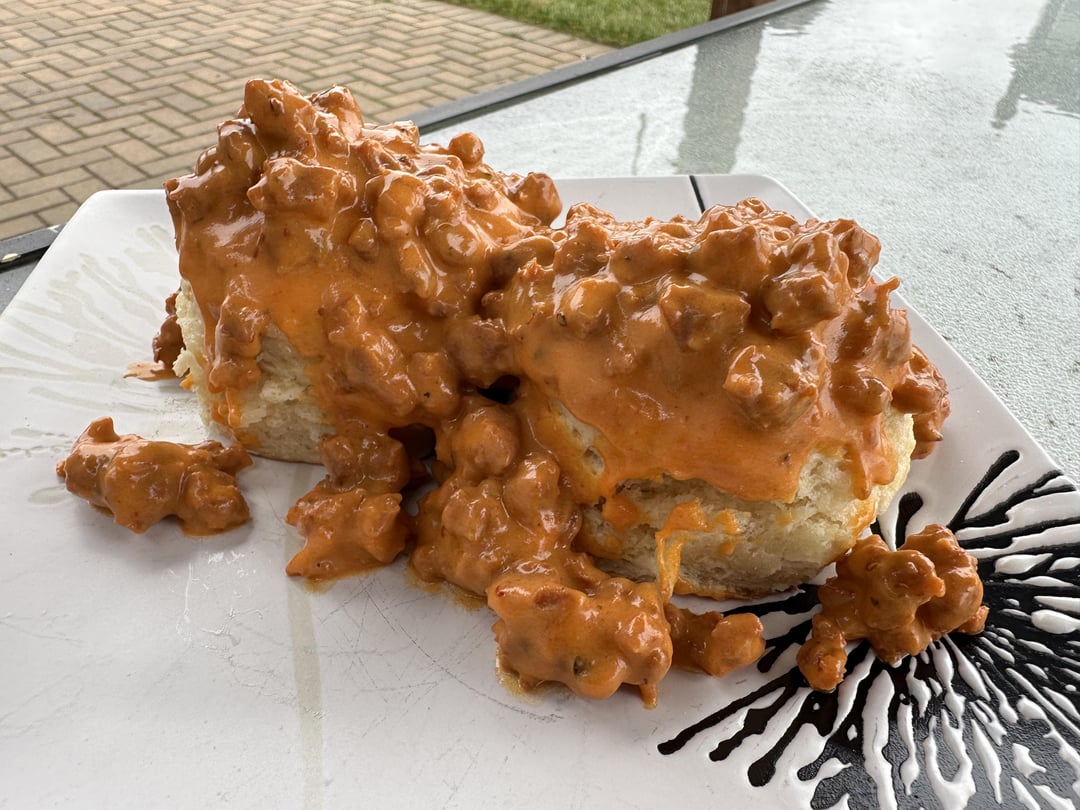 Scratch made biscuits and chorizo gravy. Delicious!! Dining and Cooking