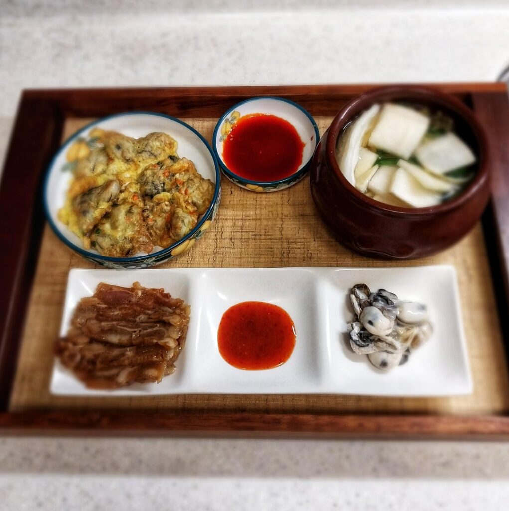 Raw oysters and oyster pancakes