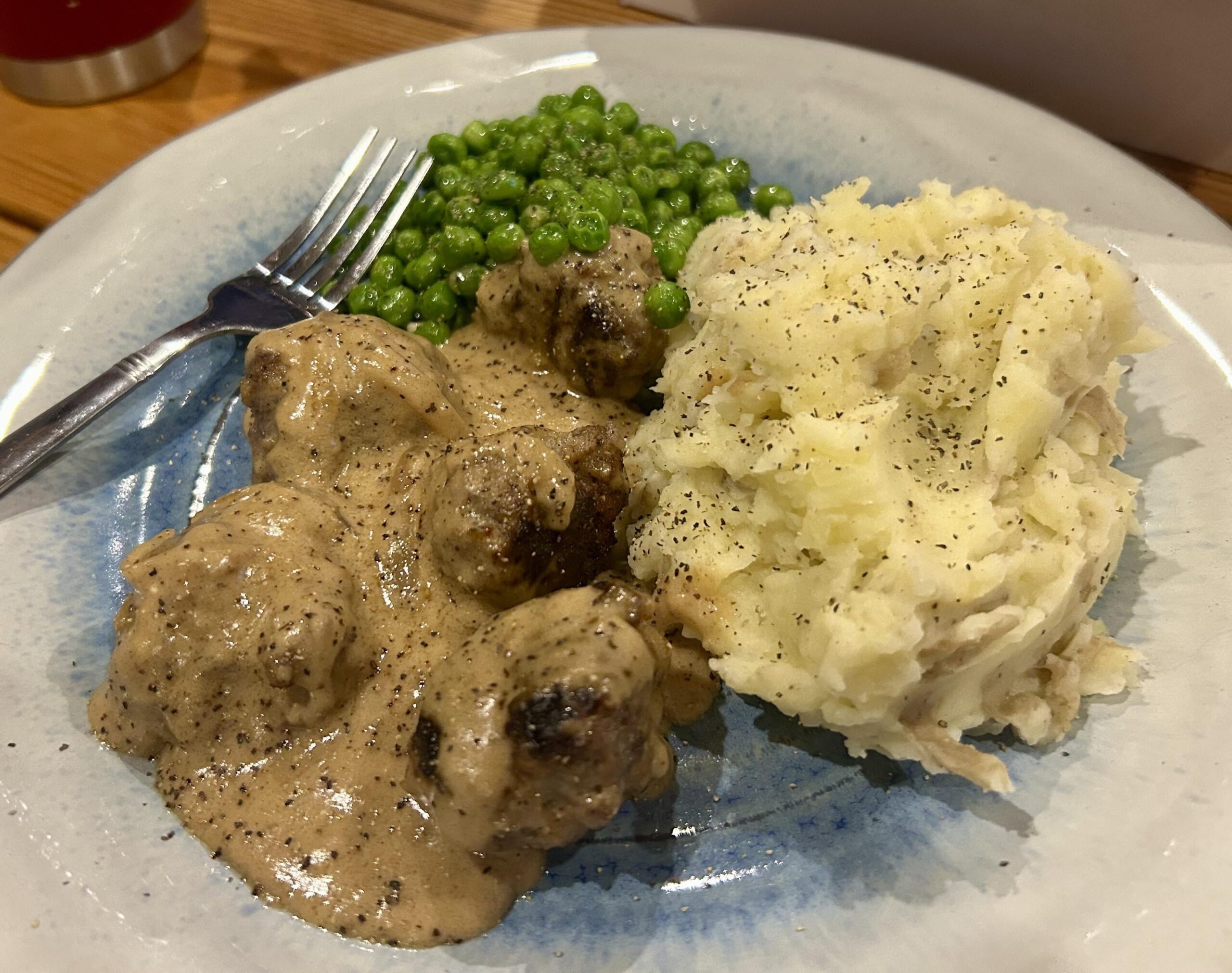 Meatballs with onion gravy, mashed potatoes, and charred peas - Dining ...