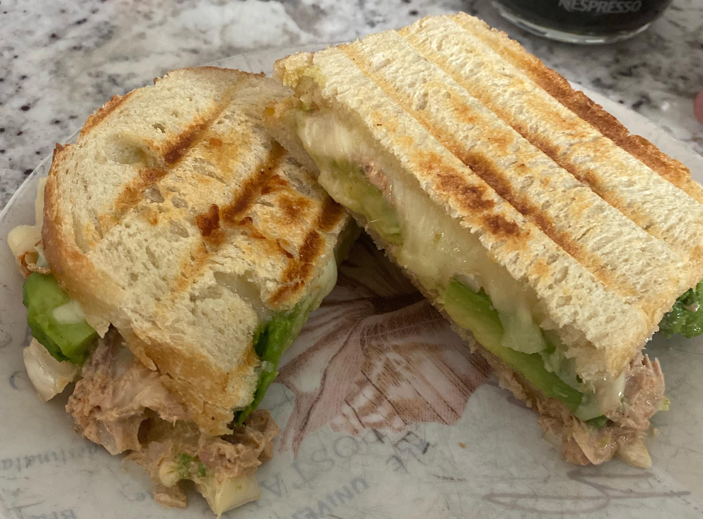 Tuna melt with onions and avocado. Dining and Cooking