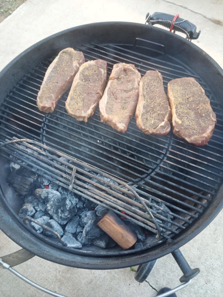 Some NY Strips on the Weber Kettle