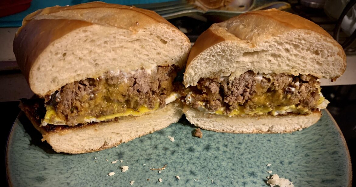 Meatloaf sandwich with a fried egg.
