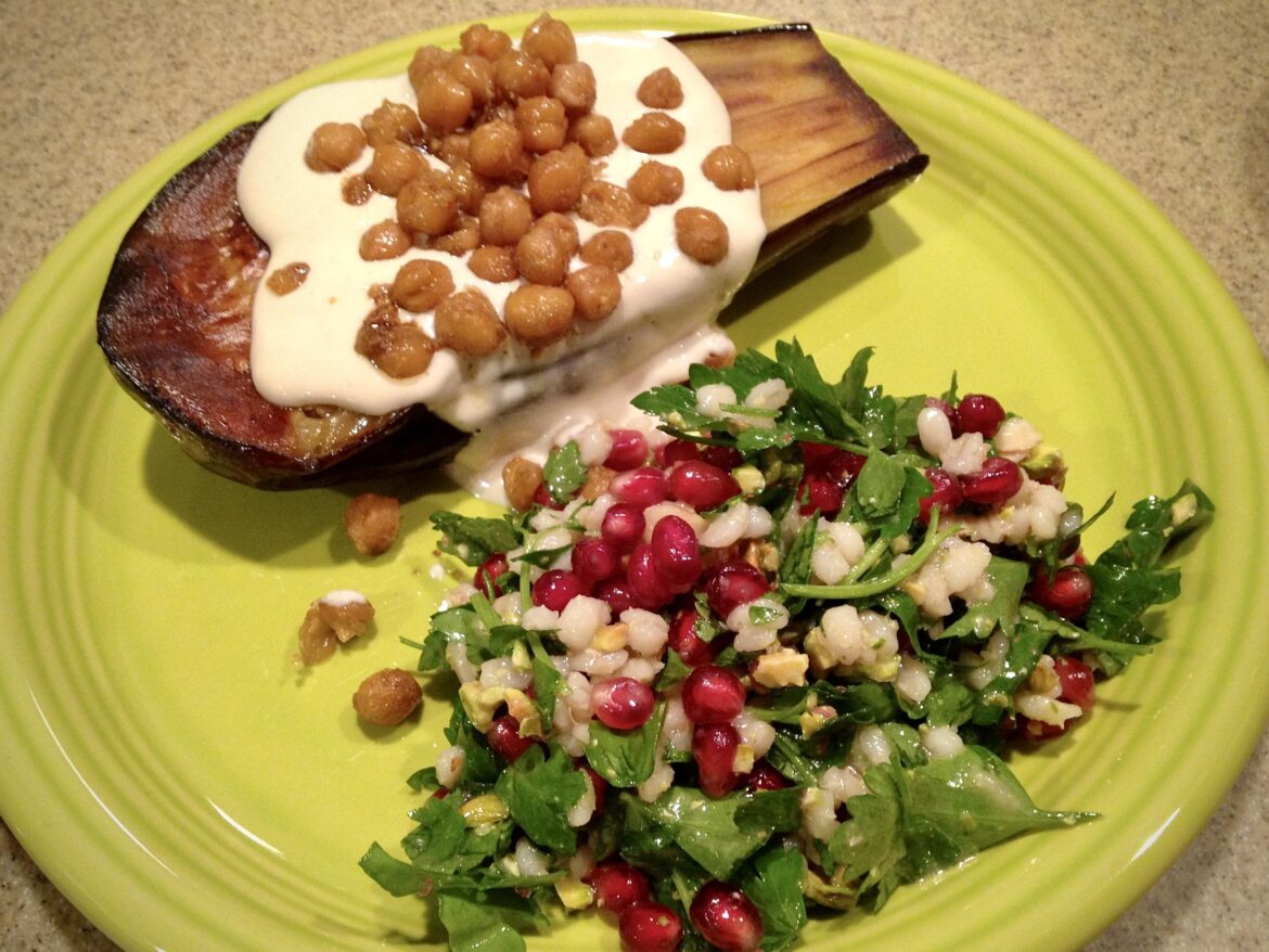 Smitten Kitchen’s Roasted Eggplant with Yogurt-Tahini Sauce and Cumin-Crisped Chickpeas. Delicious.