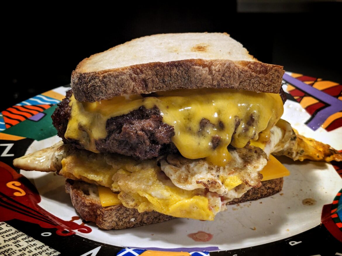 3 eggs, cast iron burger in grass fed butter, two slice of cheddar, avocado mayo on scratchmade sourdough toast