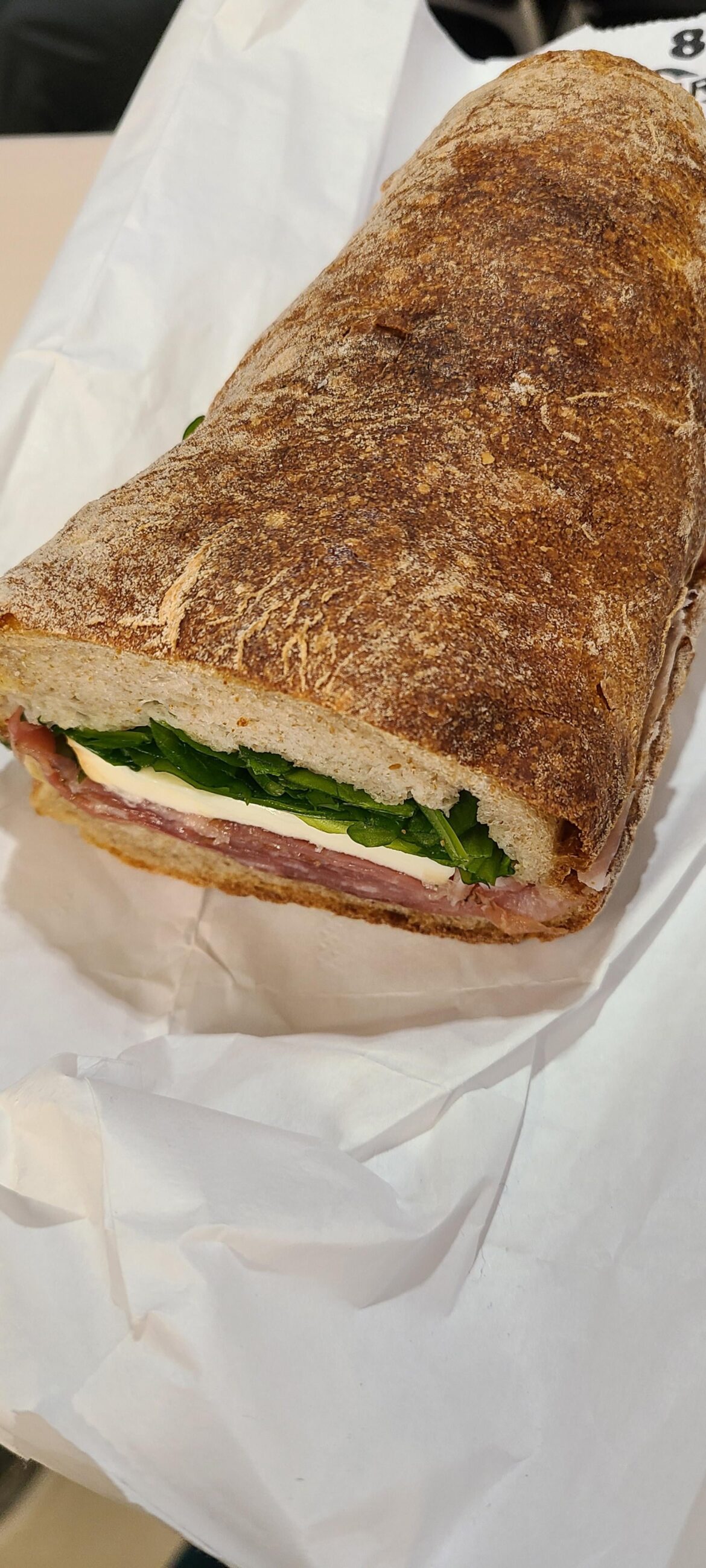 Speck, smoked mozzarella, arugula, and truffle oil