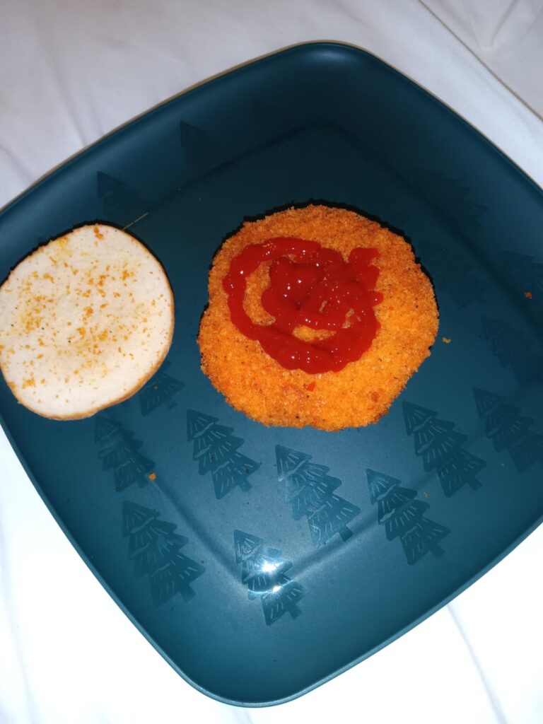 Frozen spicy chicken sandwich with jalapeno ketchup and white American cheese.