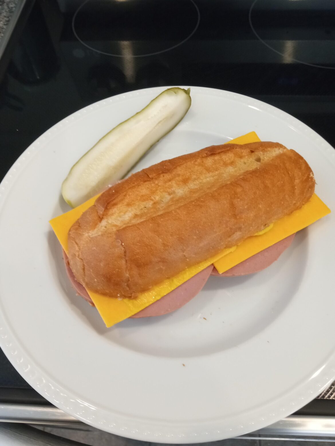 Just some Oscar Mayer bologna, cheddar cheese, and yellow mustard. The way the Good Lord intended.
