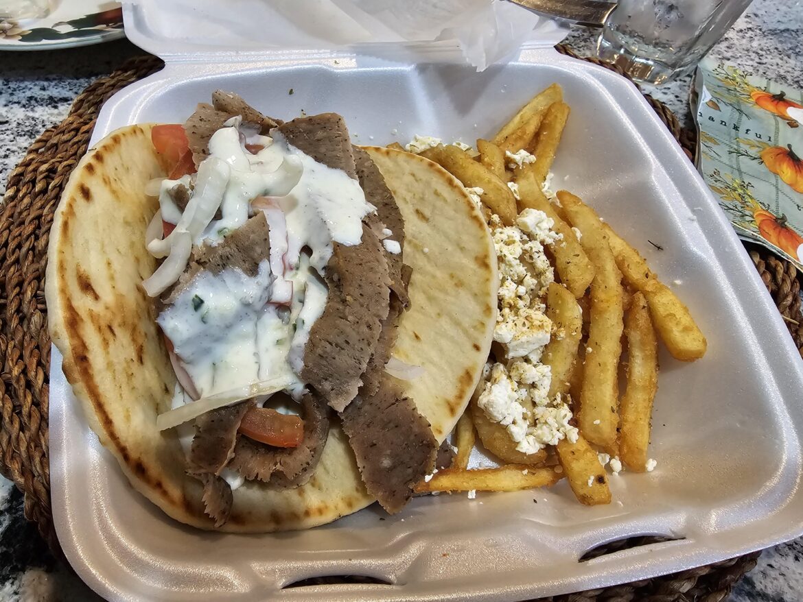Gyro with Greek Fries from a place called Cosmos Cafe in Milwaukee, Wisconsin.
