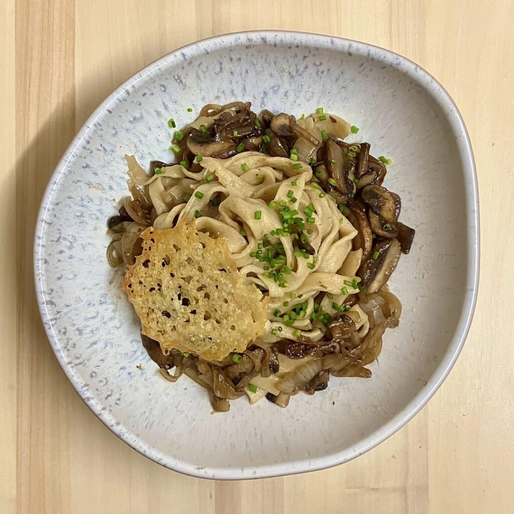 Black Garlic Tagliatelle with a Parmesan Crisp
