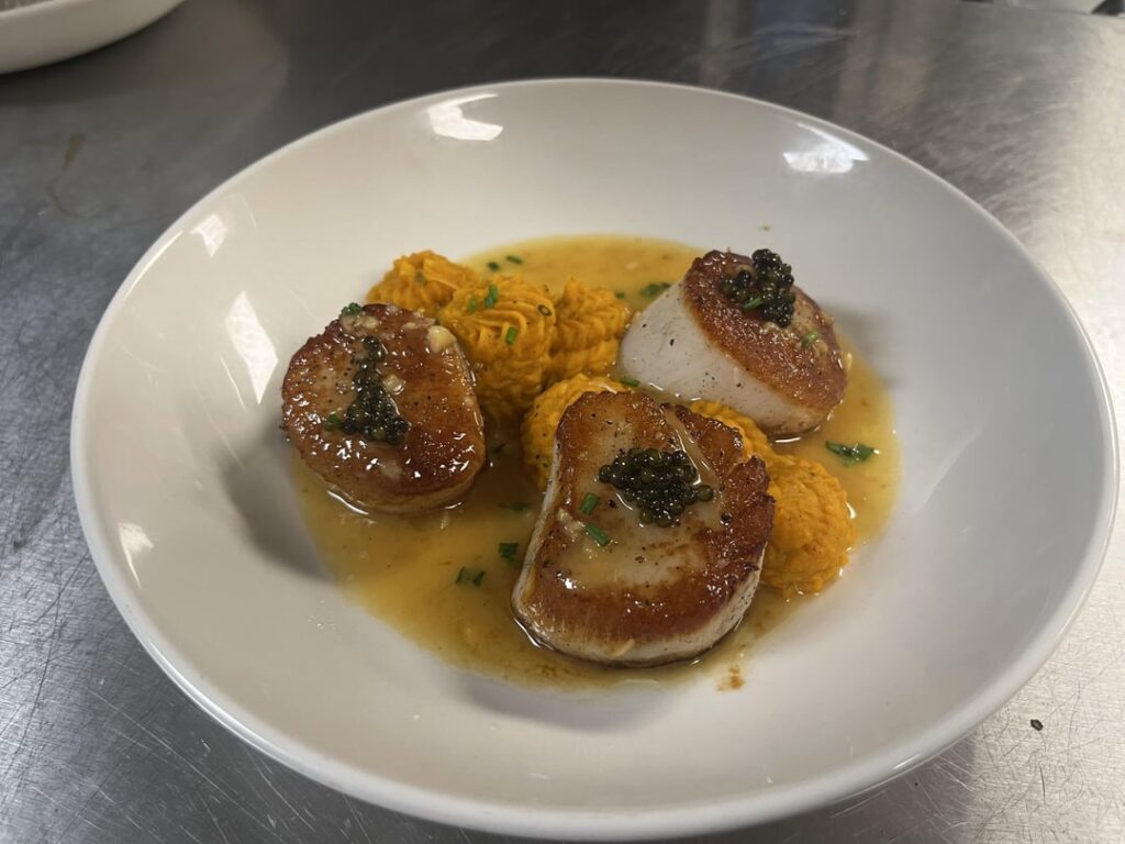 Pan seared scallops, butternut puree, burr blanc, and Ossetra caviar