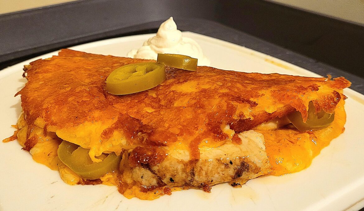 Chicken quesadilla with a fried cheese wrapped zero carb tortilla