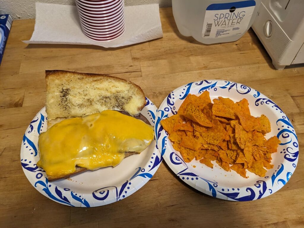 Toasted roast beef sandwich on baguette bread from Publix with Sharp Cheddar, Gouda, Mayo and Black Pepper. Made in the toaster oven.