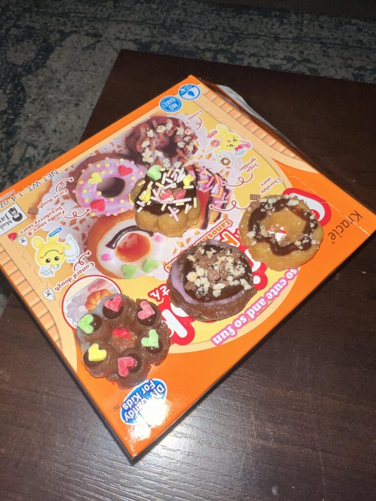 petite gateaus: tahitian reserve vanilla bean and smoked cocoa. crumb. perfume fruit tuiles.