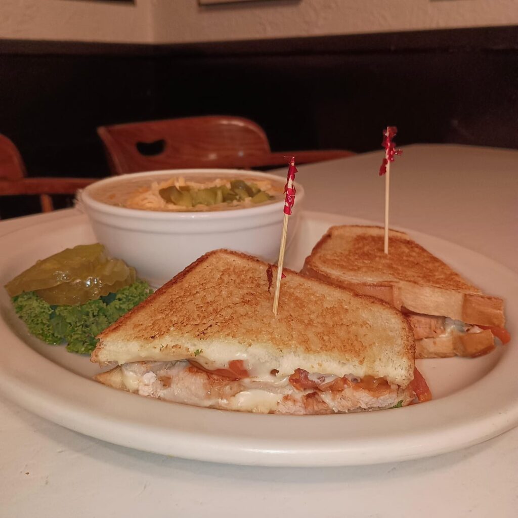 Turkey Melt on Sourdough with Swiss and Tomatoes. Served with Soup or Salad, I chose Corn Chowder and added Green Chilies, Jalapenos and Cheddar Cheese.