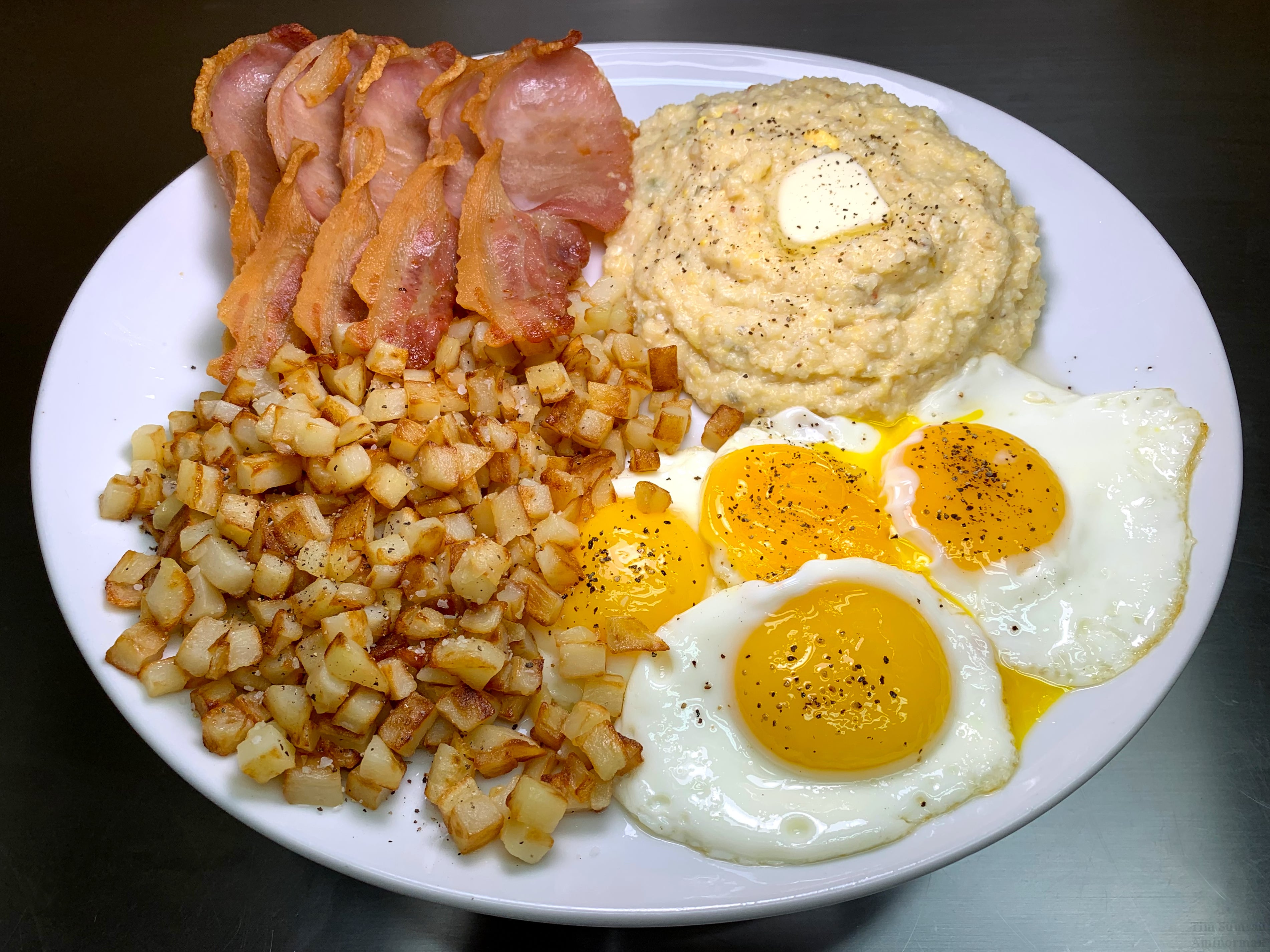 Irish Back Bacon, Diced Hash Browns, Eggy Jalapeño Cheese Grits and