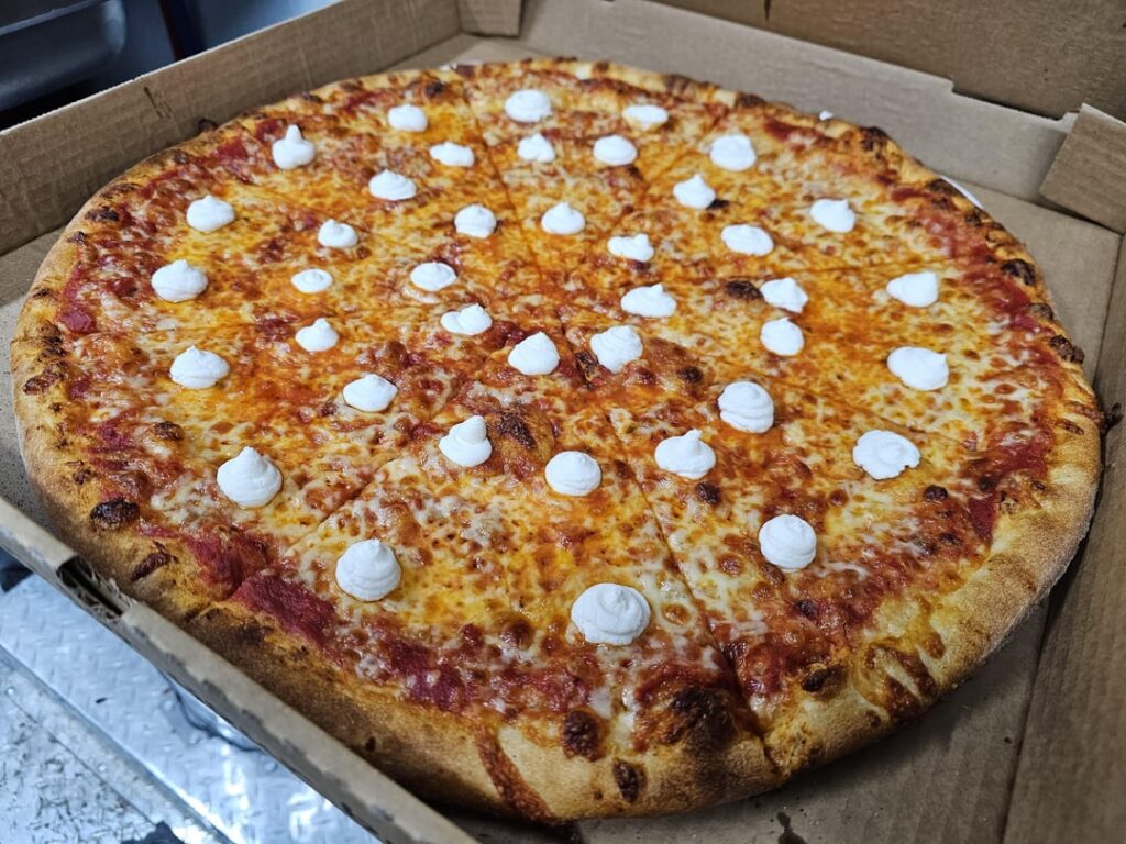 18 inch pizza w smoked mozzarella and dollops of ricotta cheese