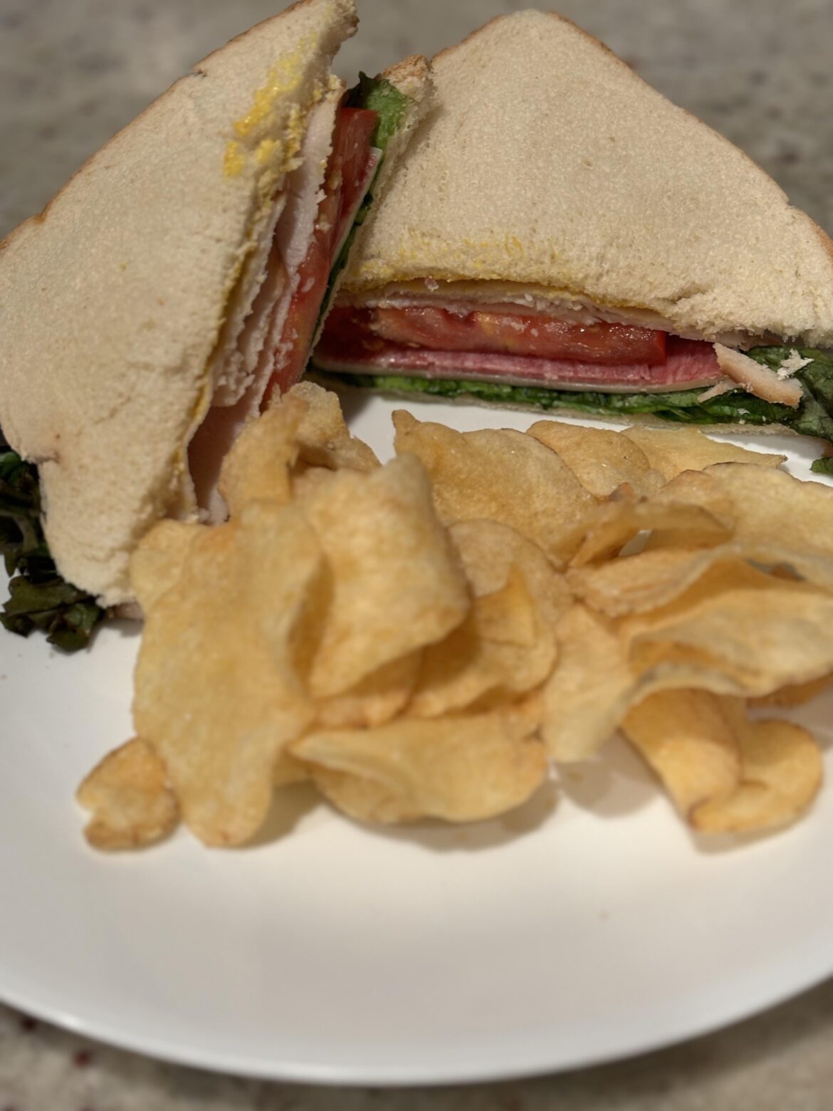 Smoked turkey, salami, lettuce, mayo, mustard, provolone cheese and tomato on white 🤌💋