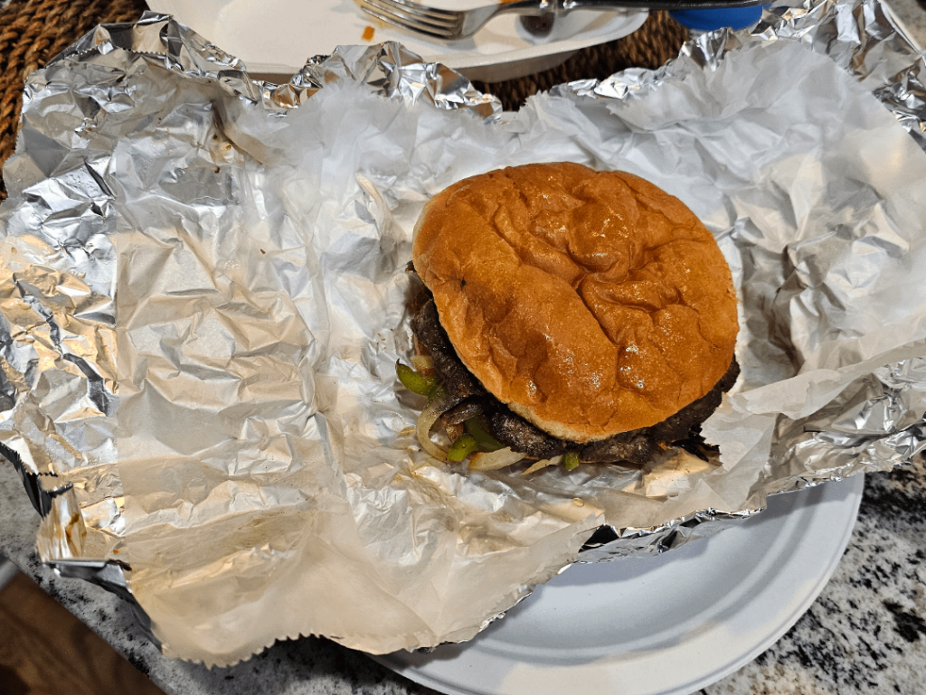 Beef Tenderloin Sandwich with Peppers, Mushrooms and Onions (I added the Lettuce) along with Fries and Onion Rings