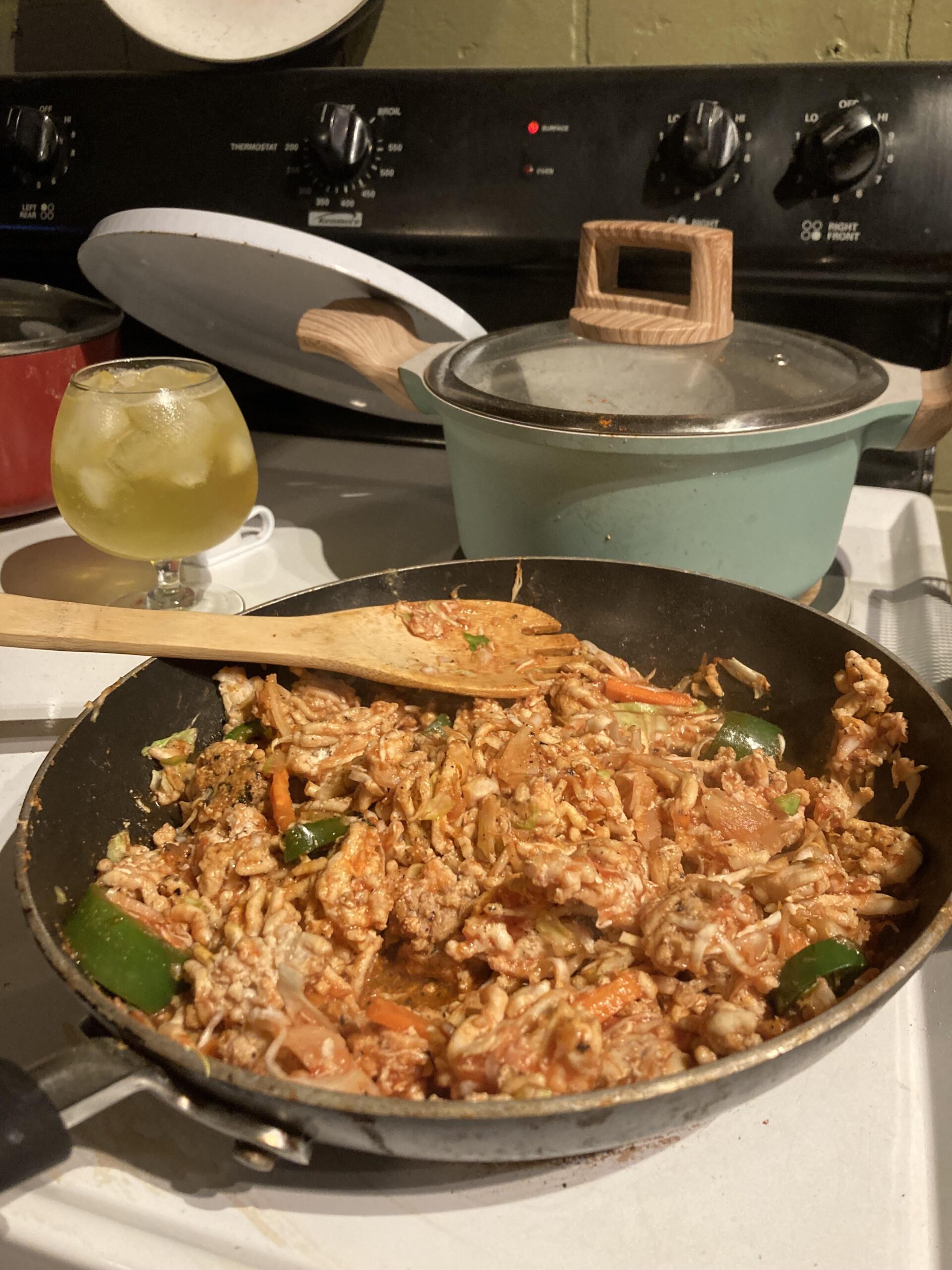 Chicken, Cole slaw, carrots, and peppers sautéed in tomato + soy sauce